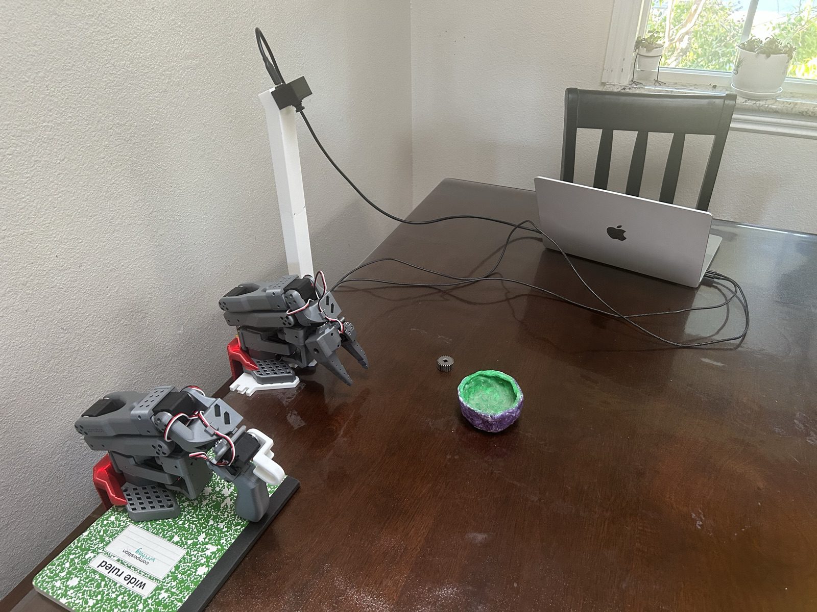 The second setup: arms on printed mounts with an overhead camera pole