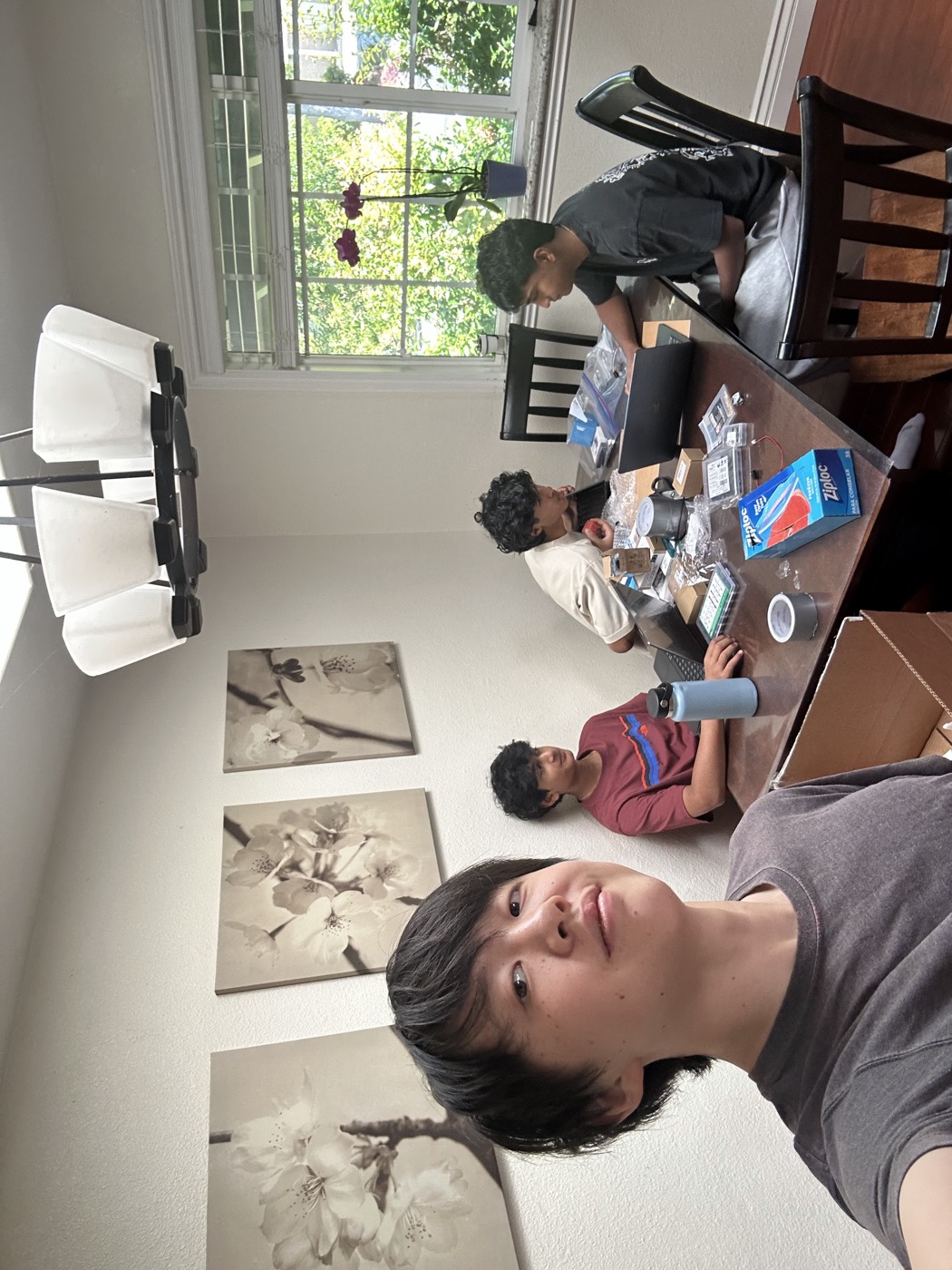 The team working around the table during a build session